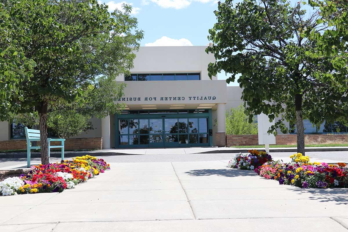 Outside of QCB building in the summer.